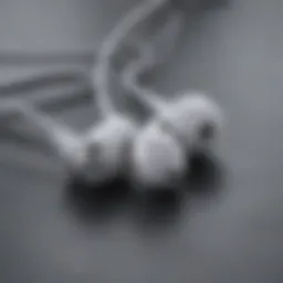A close-up view of Apple earphones showcasing their sleek design.